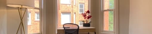 Hardwood flooring and large windows