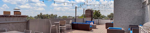 Outdoor dining table on the roof deck at 136 S. Penn