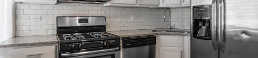 Kitchen with subway tiled backsplash