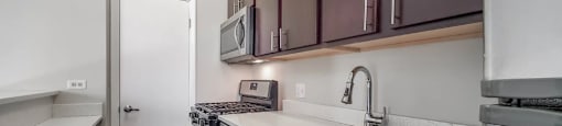 Modern and Updated Kitchen with Dark Cabinets