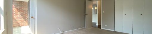 Large bedroom with balcony access