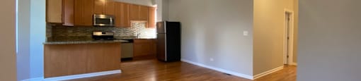 Large living space with a ceiling fan and vaulted ceilings - 2 Bedroom