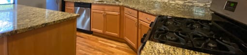 Upgraded kitchen with rich wood cabinetry - 3 Bedroom 2 Bath