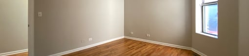 Large bedroom with rich wood flooring - 3 Bedroom 2 Bath