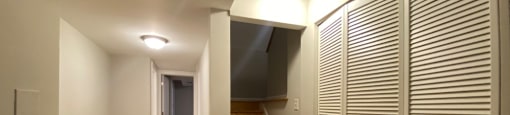 Bottom level hallway with access to top floor - 3 Bedroom 2 Bath