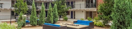 Outdoor fire pit with comfortable couch seating