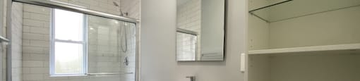 Updated bathroom with a step in shower with glass doors - 2 Bedroom