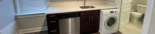 Washer dryer combo in kitchen