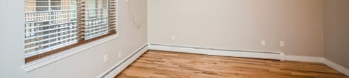 Wood slat blinds on the windows.  Lots of natural lighting at 23–33 Pearl St in Denver, CO