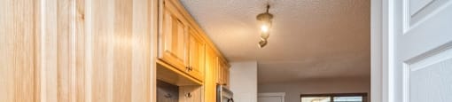 Spacious kitchen with views to the living room area at 23–33 Pearl St in Denver, CO