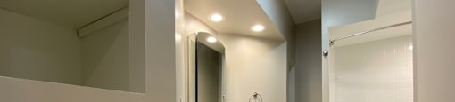 Bathroom with large linen closet
