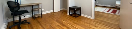 Bedroom with a closet and hardwood flooring