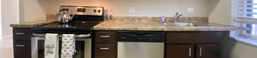 Stainless steel appliances with a built in microwave - 2 Bedroom A