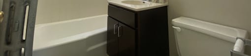 Bathroom with a full tub with tiled surround - 2 Bedroom A