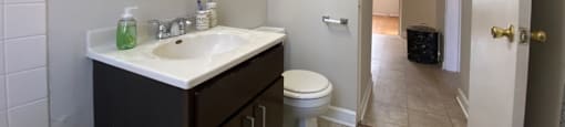 Bright bathroom with vanity storage - 2 Bedroom A