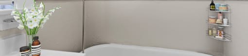 Classic charm meets modern simplicity in this serene bathroom 1170 N Logan St in Denver, CO