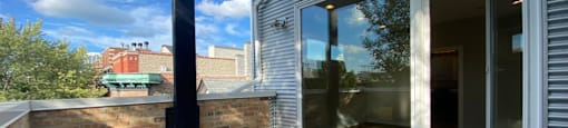 Enjoy the beautiful city views from main suite bedroom balcony