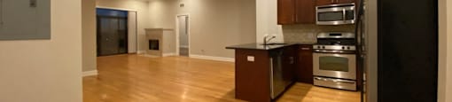 Open concept layout with gorgeous wood flooring - 3 Bedroom