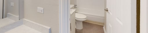 All- white bathroom  at 4805 E Kentucky in Denver, CO