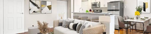 A modern living room with a white sofa and a glass coffee table  at 4805 E Kentucky in Denver, CO