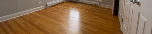 Bedroom with a ceiling fan and large closets - Two Bedroom