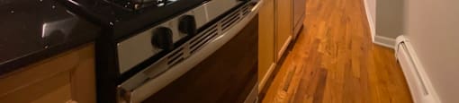 Stainless steel appliances with a built in microwave - Large One Bedroom