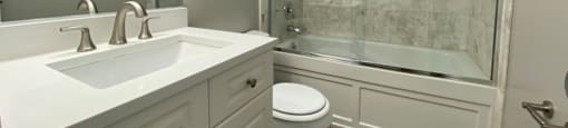 Bathroom with vanity storage - One Bedroom