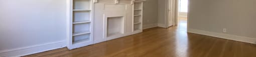 Hardwood flooring and decorative fireplace