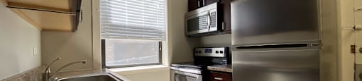 Stainless steel appliances with a built in microwave