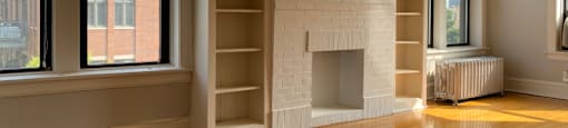 Brick mantel with bookshelf storage