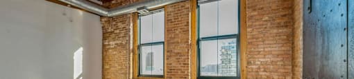Modern industrial vibe with chic historic touches at Carriage House Lofts, Chicago, Illinois