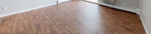 Large living space empty, but perfect for living room customization at 4600 E Kentucky Ave in Denver, CO