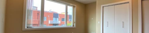 Large bedroom with hardwood floors