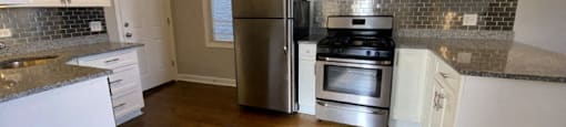 Granite countertops, hardwood floors, upgraded cabinetry