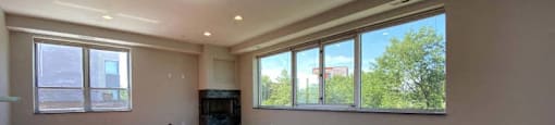 Large windows and a built-in fireplace