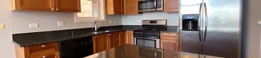 Stunning granite countertops in the large kitchen space