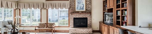 Bright and open clubhouse with fireplace