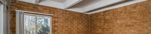 Exposed brick walls and ceiling beams