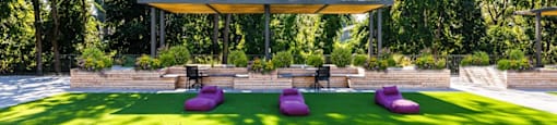 a seating area in the middle of a lawn