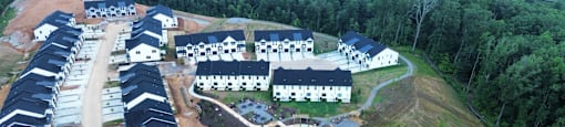 A large housing development with a central courtyard.