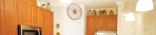 Upgraded Kitchen with Granite Countertops and Kitchen Pantry