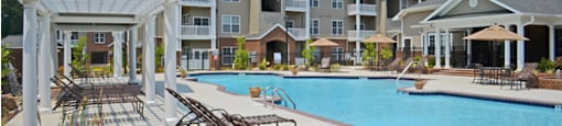 Swimming Pool with Pergola and Lounge Seating