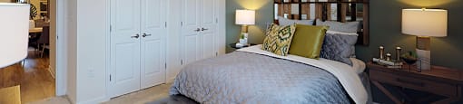 Bedroom with closets; hallway bathroom