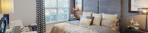 Bedroom with ceiling fan and window