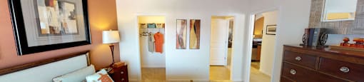 Bedroom with walk-in closet; bathroom accessible by bedroom and hallway