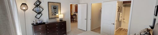 Bedroom with in-room bathroom; walk-in closet
