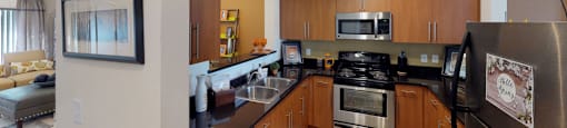 Kitchen with black granite countertops; open to living room