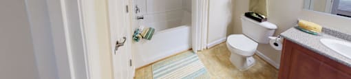 Bathroom with sink, toilet, shower and tub
