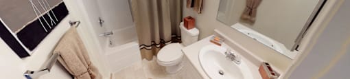 Bathroom with sink, toilet, shower and tub