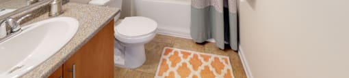 Bathroom with sink, toilet, shower and tub